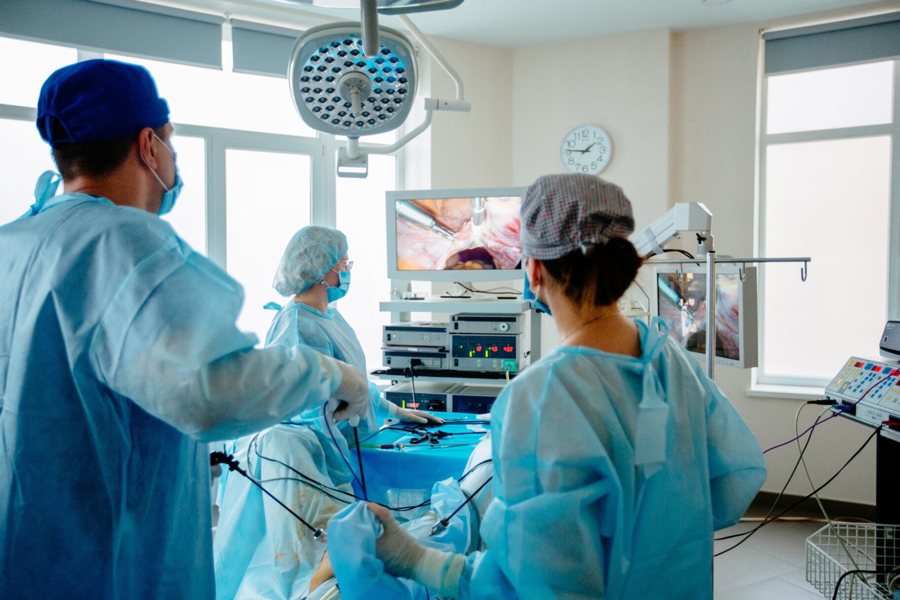 Laparoscopic surgical procedure in progress inside a modern operating room
